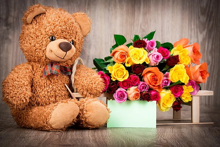 Connect with Cuddly teddy bear with a bouquet of flowers